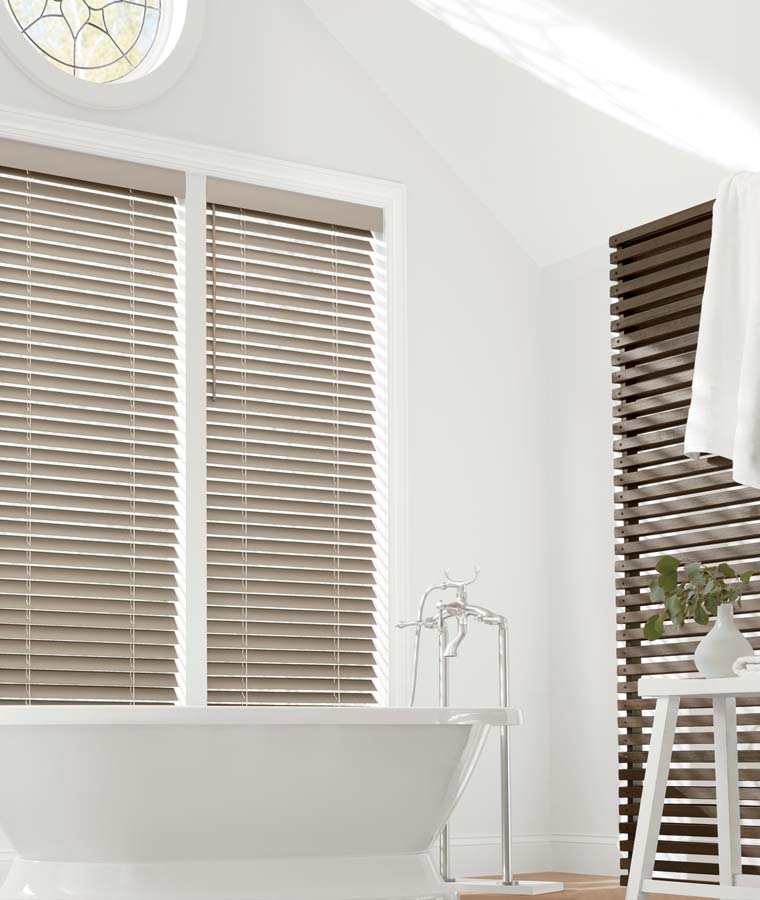 alternative wood light stain blinds in bright bathroom with wood slat accent wall